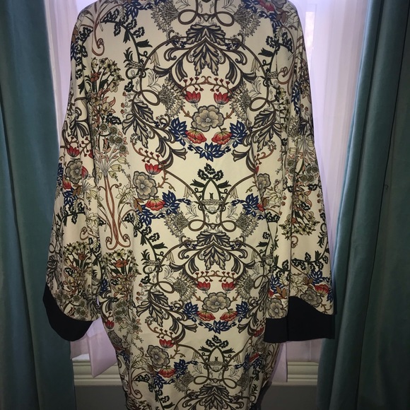 Shrug - Picture 3 of 3